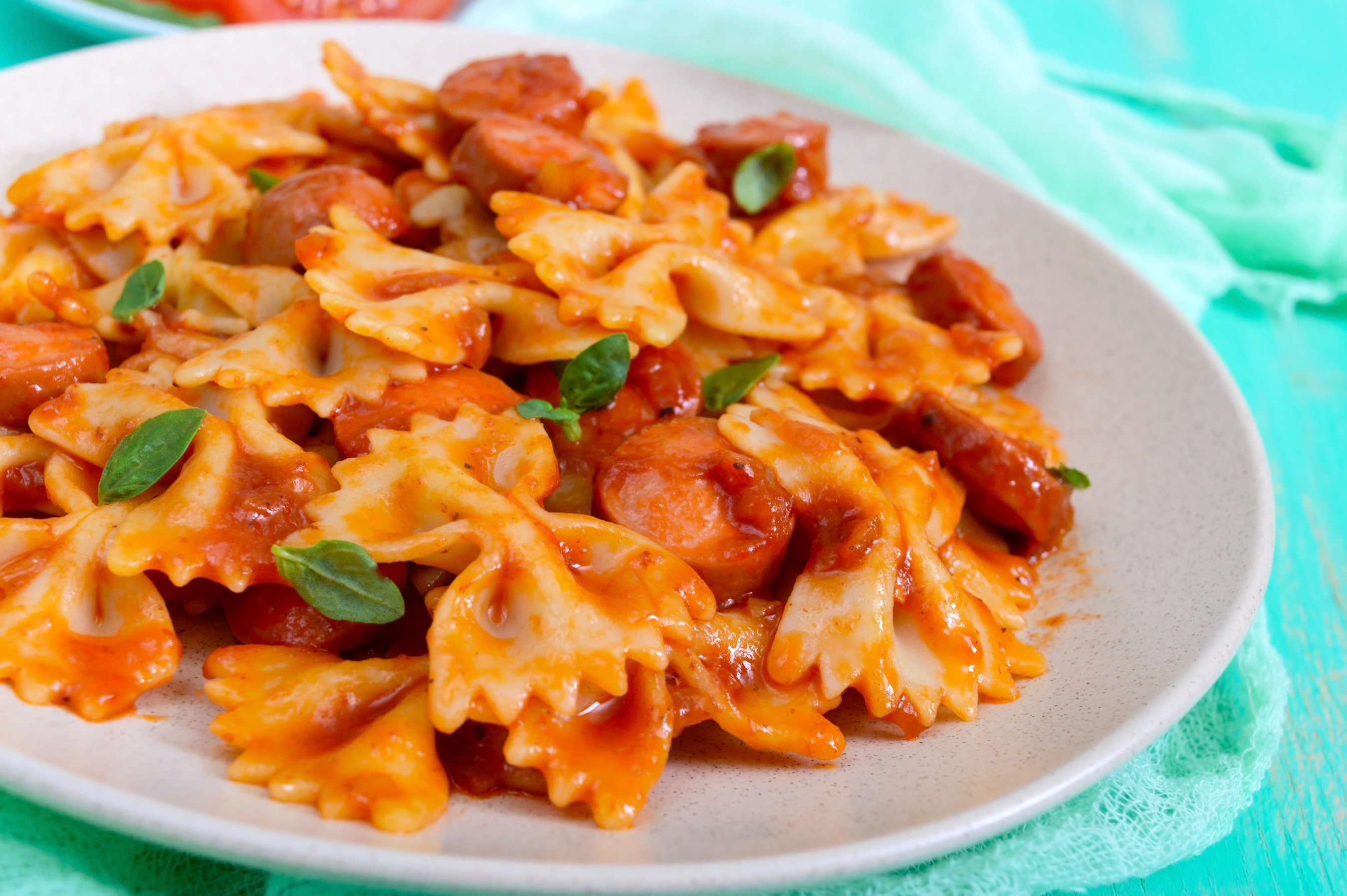 Quick sausage and tomato pasta Recipe